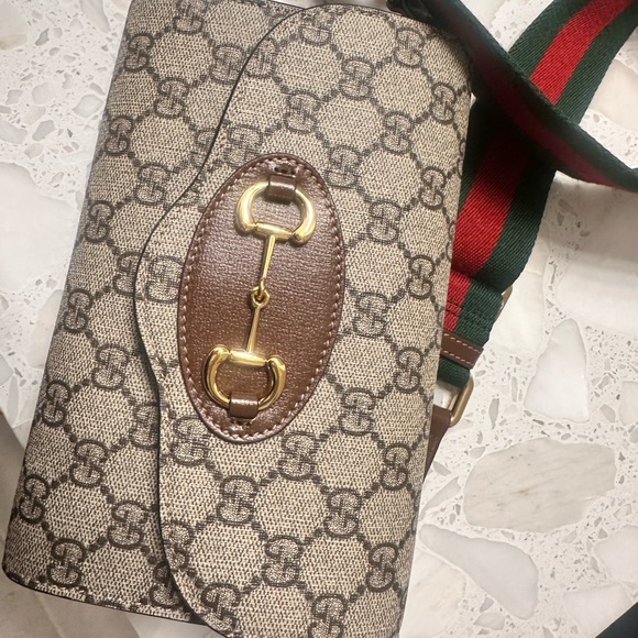 Gucci Handbags - Gucci Beige and Brown Crossbody Bag with Gold Accents
Like new condition